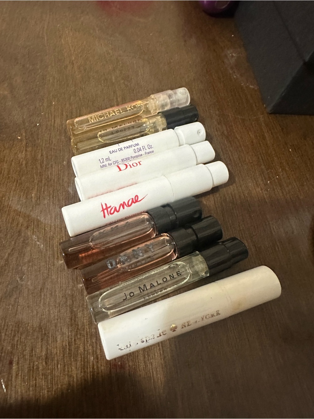 Jo Malone clear travel perfume vial with black cap
